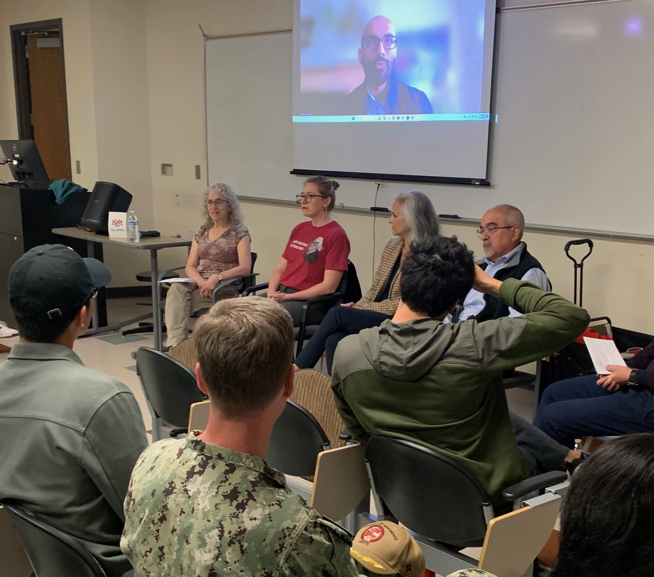 Anand Macherla joins the Pizza with Professionals event via Zoom. The panel, from left to right, included Melissa Binder, Alison Turner, Christina Campos and James Jimenez